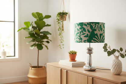Green and white botanical lampshade in interior setting